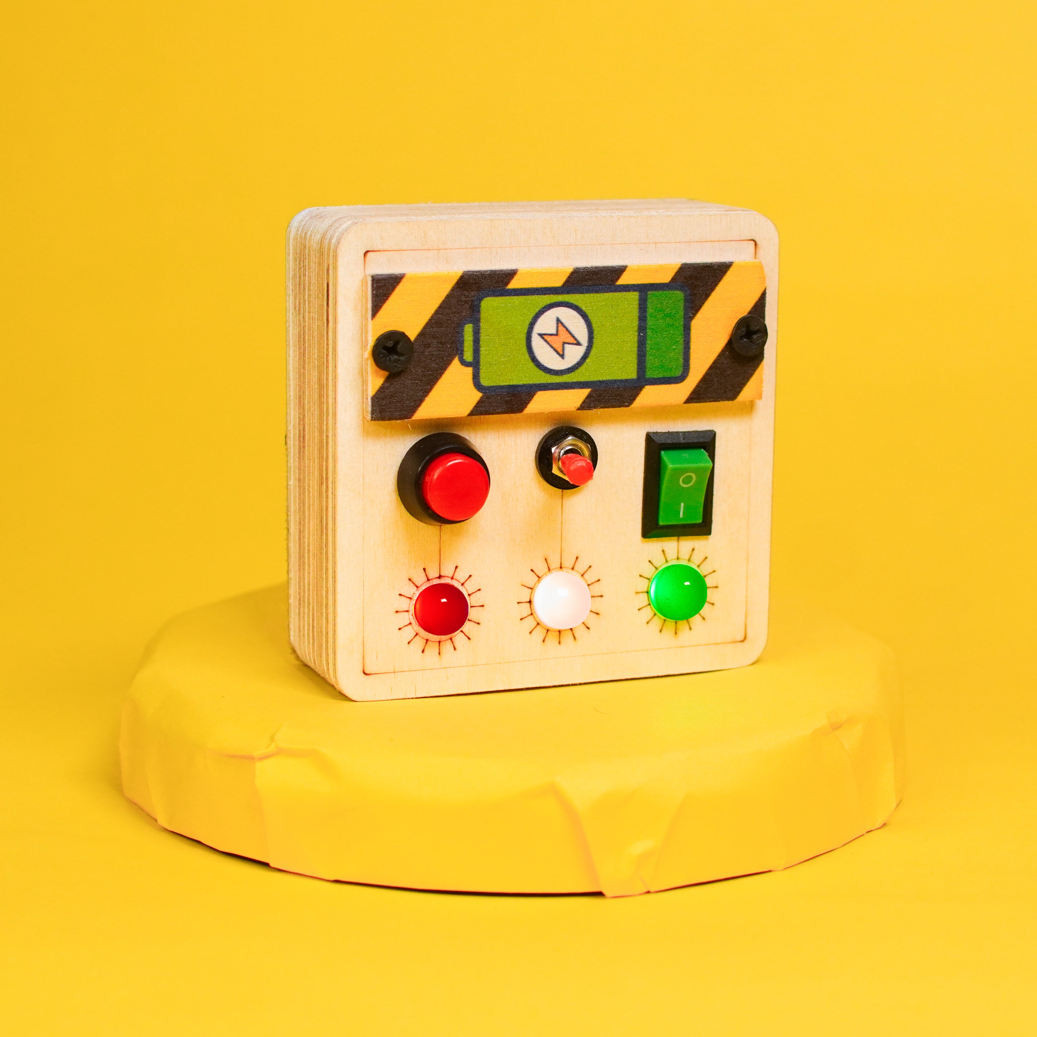 Side view of the Toddler Montessori Portable Switches Busy Board Mini Version, showcasing its compact design and portable features.